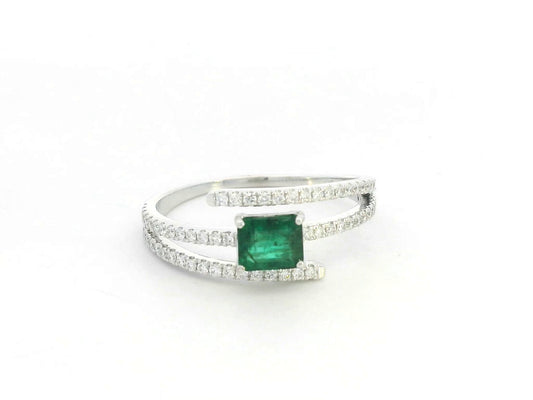 18K white gold emerald and diamond open wrap ring with square emerald center and pavé bands