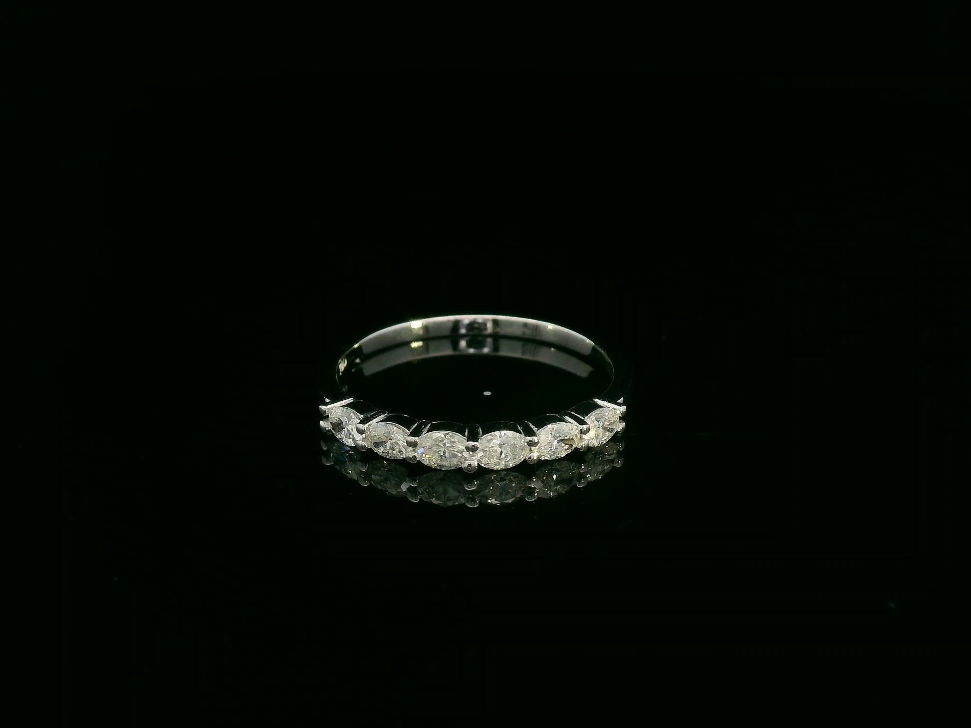 18K white gold oval diamond band ring with 0.47 carat total diamond weight – Emirates Diamonds