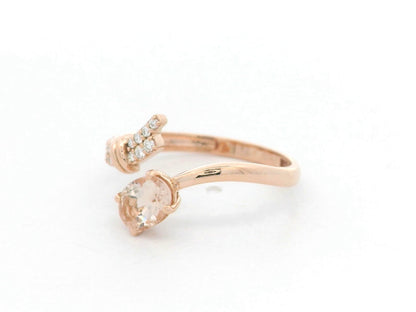 18K rose gold oval morganite and diamond crossover ring 0.65 carat by Emirates Diamonds