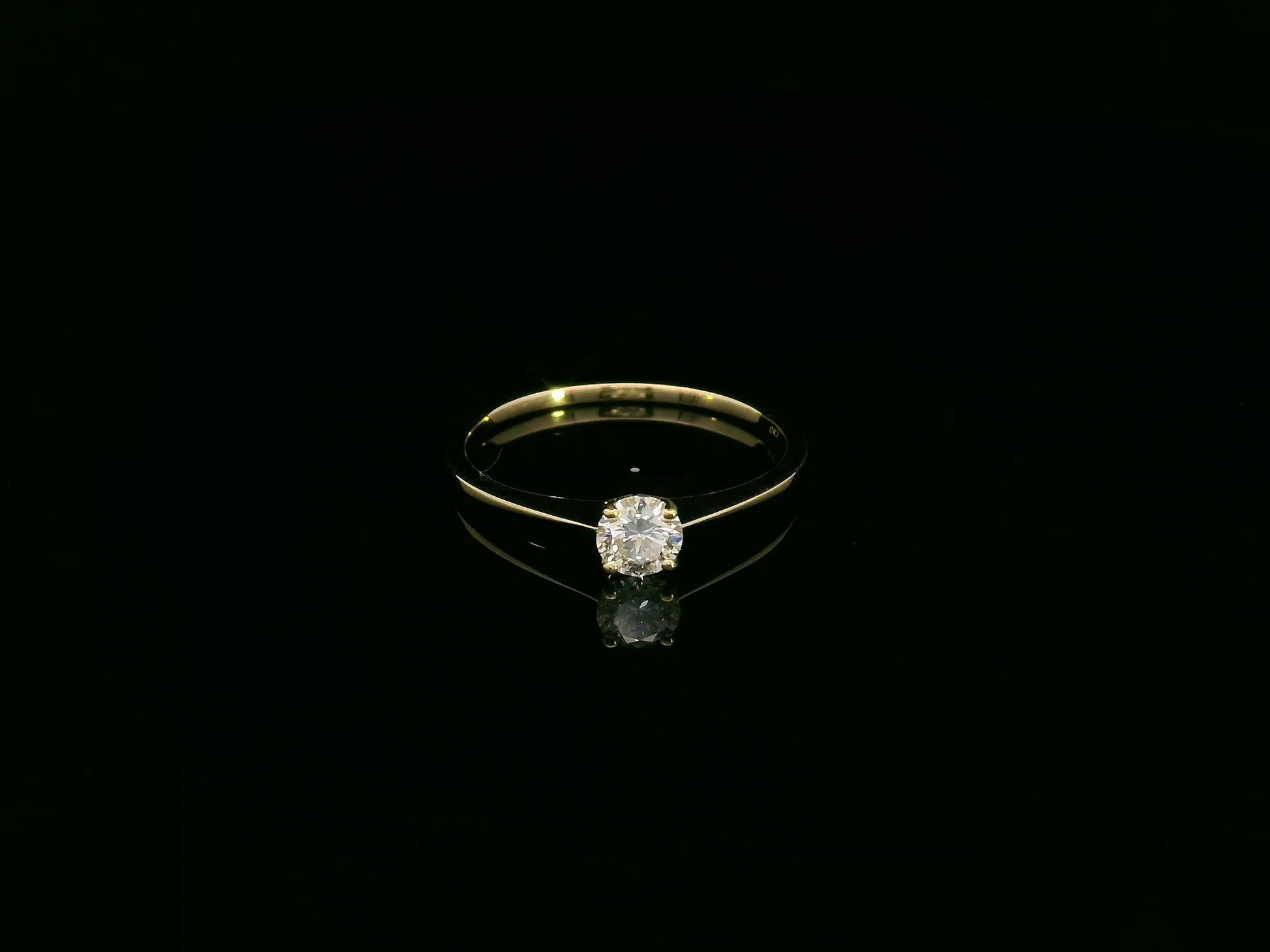 0.30 carat diamond solitaire ring crafted in solid 18K yellow gold by Emirates Diamonds