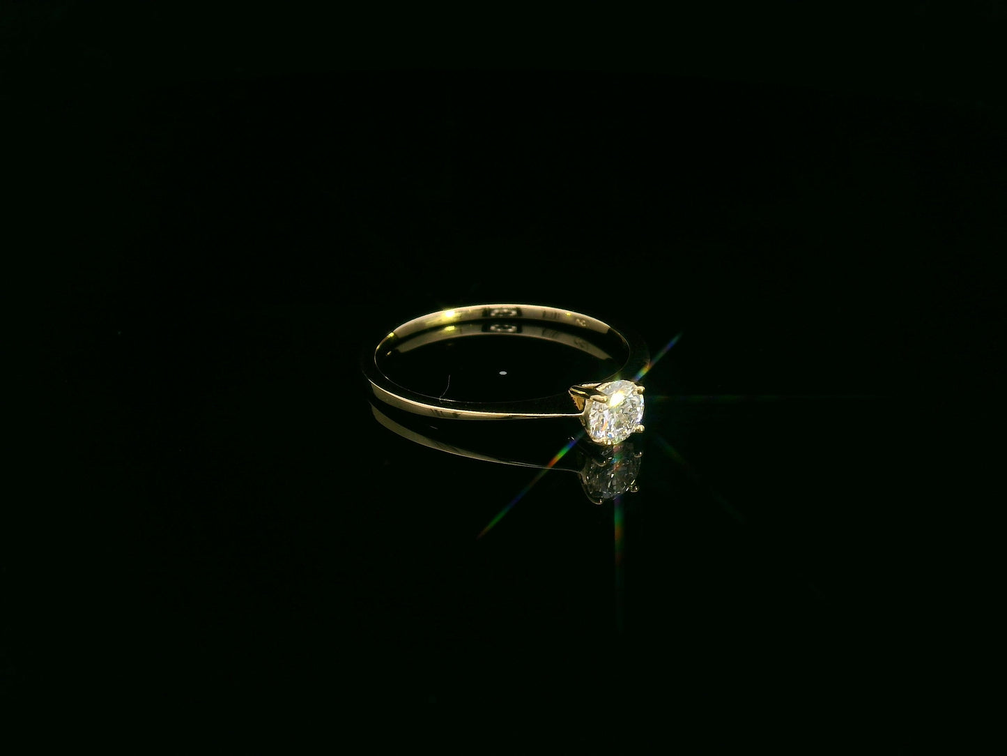 0.30 carat diamond solitaire ring crafted in solid 18K yellow gold by Emirates Diamonds