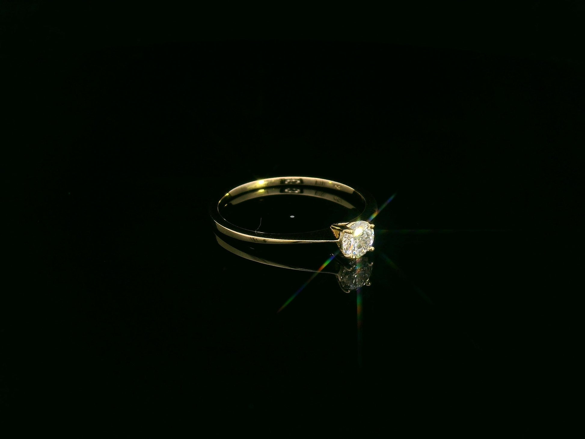 0.30 carat diamond solitaire ring crafted in solid 18K yellow gold by Emirates Diamonds