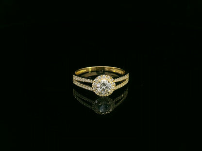 0.75 carat round diamond halo ring in 18K yellow gold with split diamond band by Emirates Diamonds