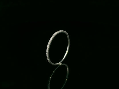 18K white gold slim diamond band with delicate pavé-set diamonds by Emirates Diamonds