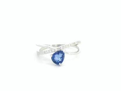 1.01 carat pear shaped blue sapphire and diamond crossover ring in 18K white gold by Emirates Diamonds
