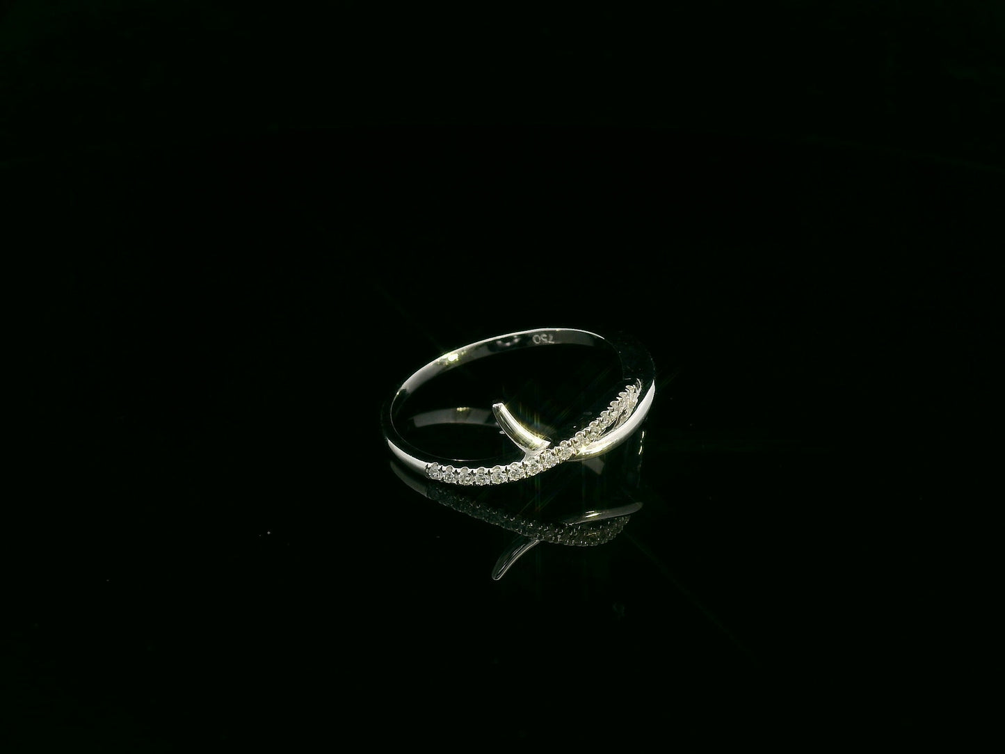 0.11 carat diamond crossover ring in 18K white gold by Emirates Diamonds