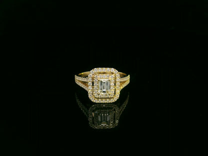 0.58 carat IGI certified emerald cut diamond halo ring in 18K yellow gold with 0.56 carat pavé diamonds by Emirates Diamonds.