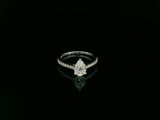 1.01 carat GIA certified pear diamond engagement ring in 18K white gold with pavé band by Emirates Diamonds Dubai
