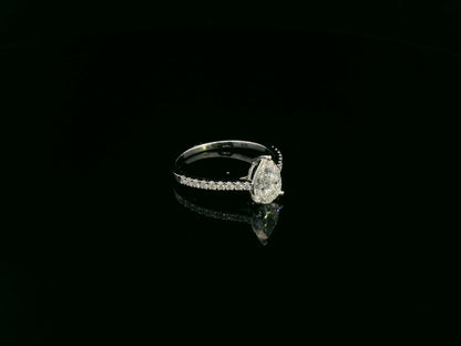 1.01 carat GIA certified pear diamond engagement ring in 18K white gold with pavé band by Emirates Diamonds Dubai