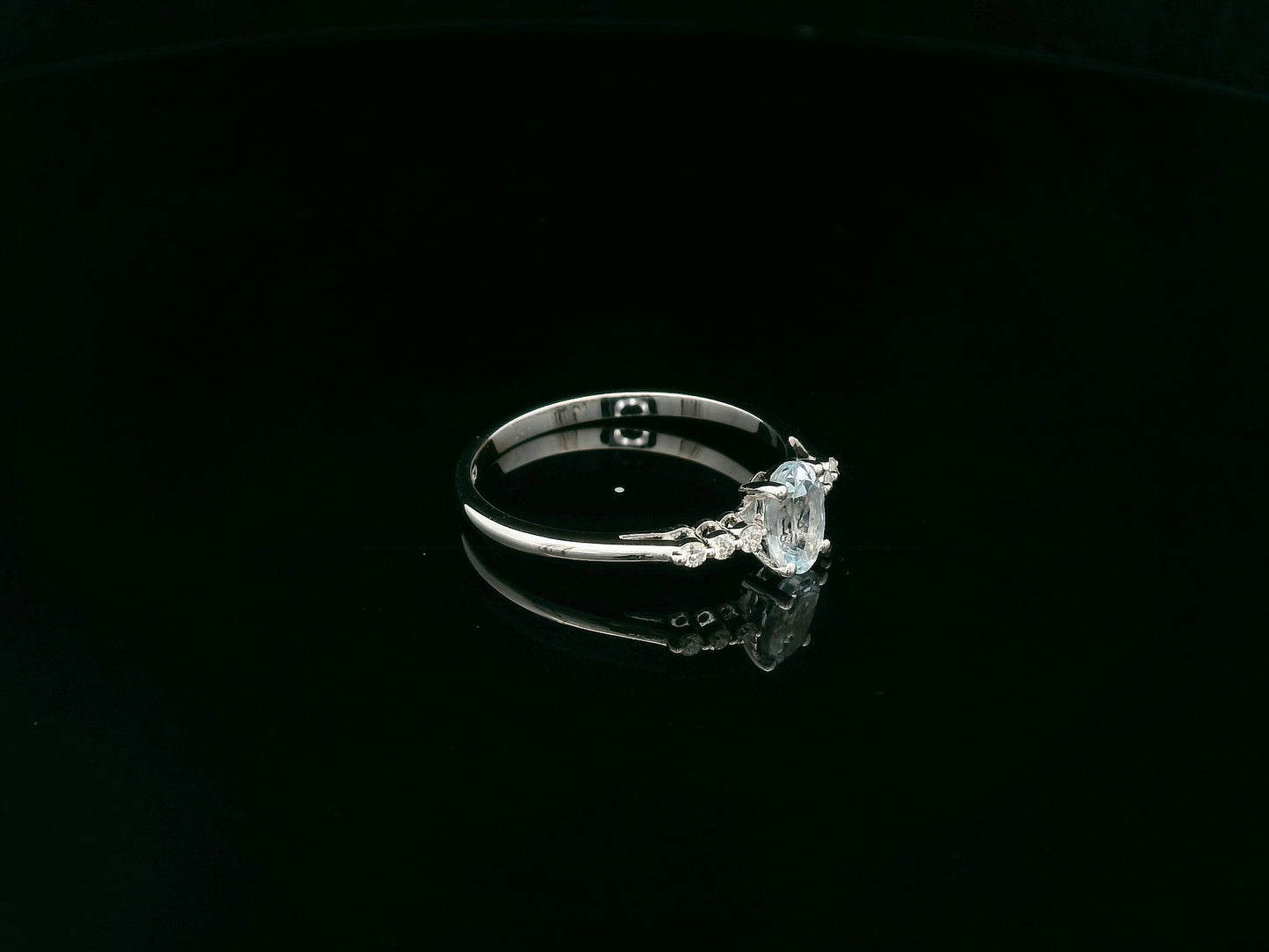 Oval aquamarine ring 0.47 carat with diamond accents in 18K white gold by Emirates Diamonds