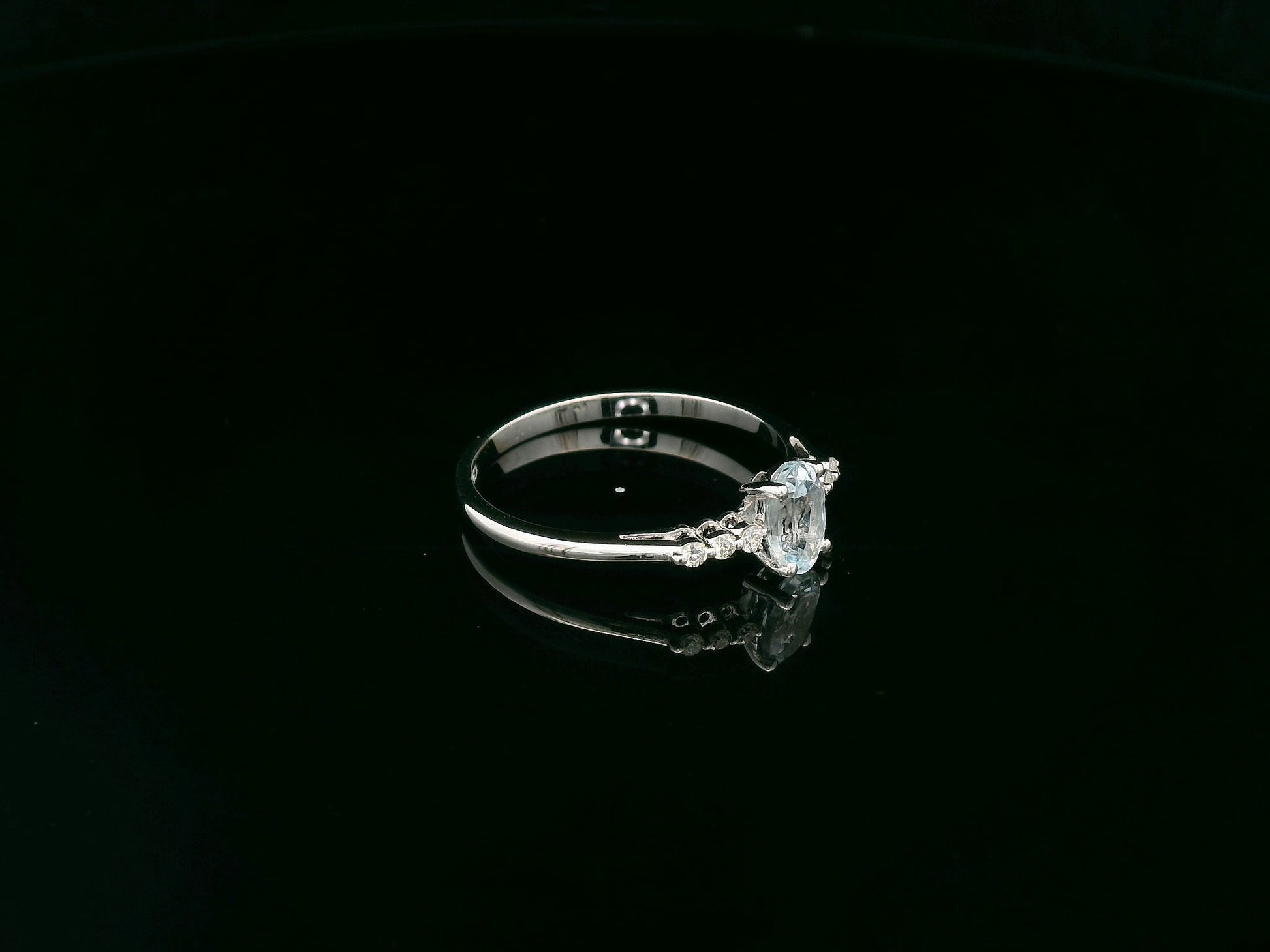 Oval aquamarine ring 0.47 carat with diamond accents in 18K white gold by Emirates Diamonds