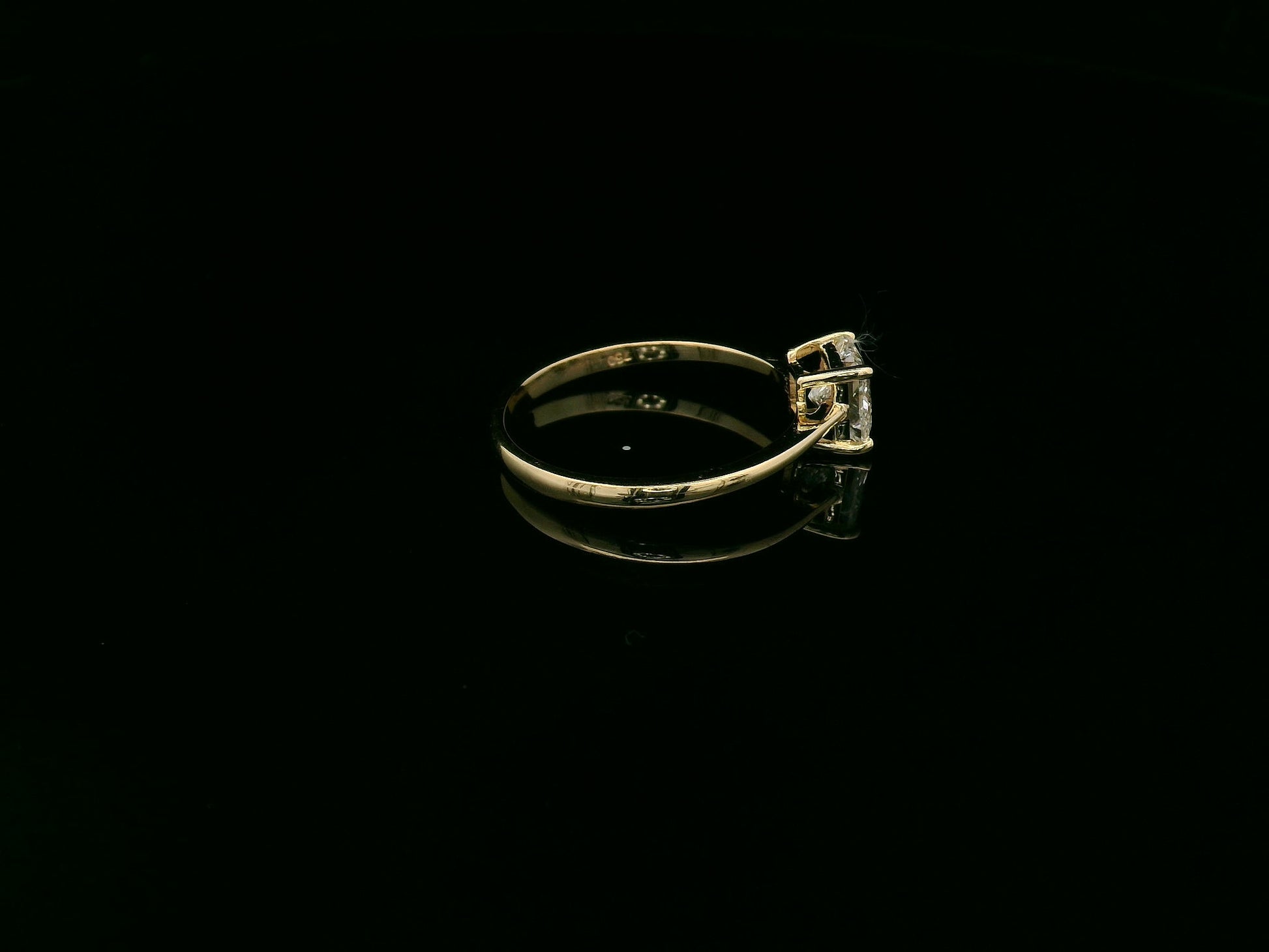 Princess cut diamond solitaire ring in 18K yellow gold by Emirates Diamonds