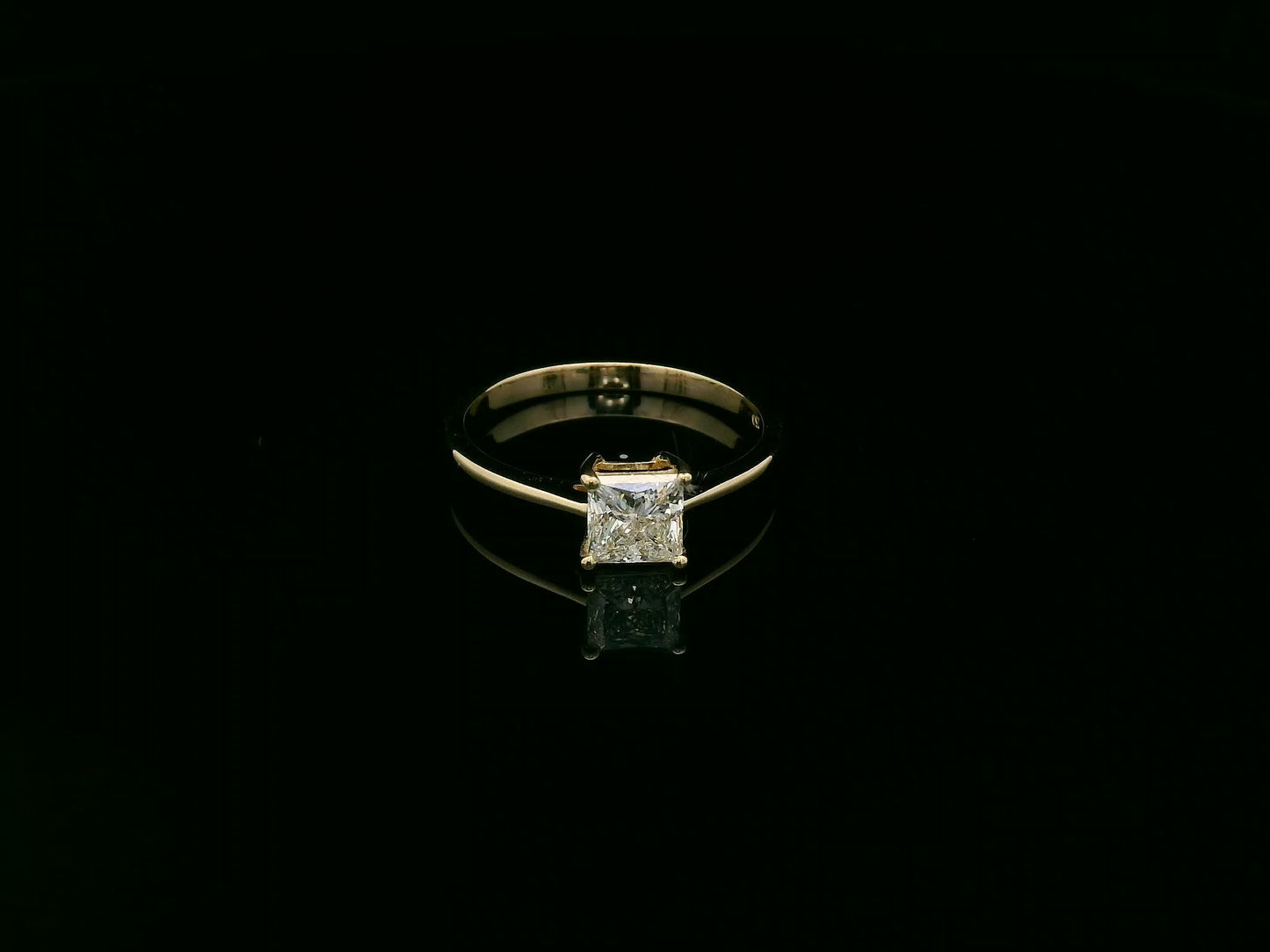 Princess cut diamond solitaire ring in 18K yellow gold by Emirates Diamonds
