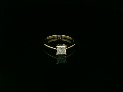 Princess cut diamond solitaire ring in 18K yellow gold by Emirates Diamonds