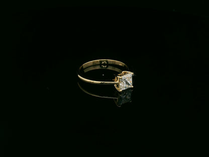 Princess cut diamond solitaire ring in 18K yellow gold by Emirates Diamonds