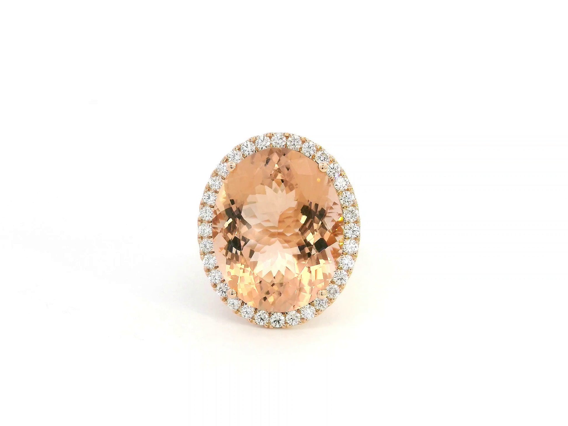 20.67 carat oval morganite diamond halo ring in 18K rose gold by Emirates Diamonds