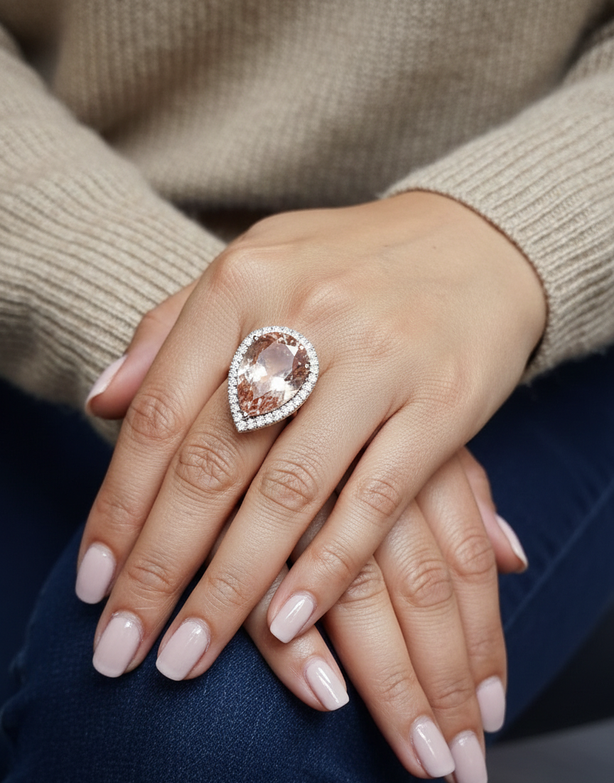 27.07 carat pear morganite and diamond halo statement ring in 18K rose gold by Emirates Diamonds Dubai