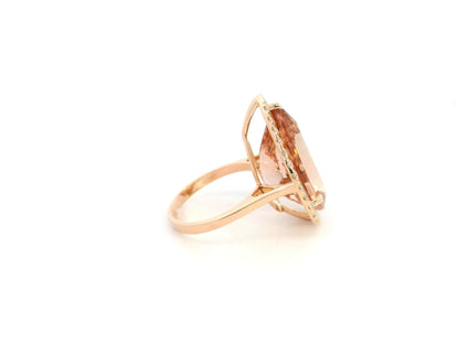 27.07 carat pear morganite and diamond halo statement ring in 18K rose gold by Emirates Diamonds Dubai