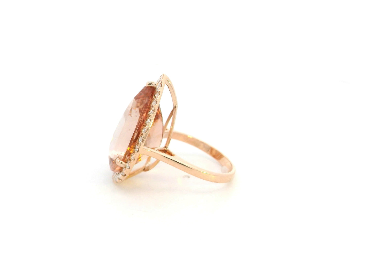 27.07 carat pear morganite and diamond halo statement ring in 18K rose gold by Emirates Diamonds Dubai