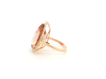 27.07 carat pear morganite and diamond halo statement ring in 18K rose gold by Emirates Diamonds Dubai