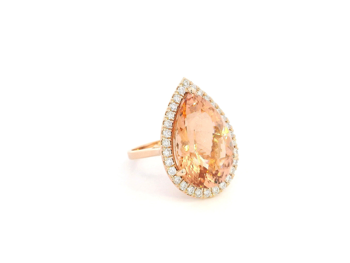 27.07 carat pear morganite and diamond halo statement ring in 18K rose gold by Emirates Diamonds Dubai