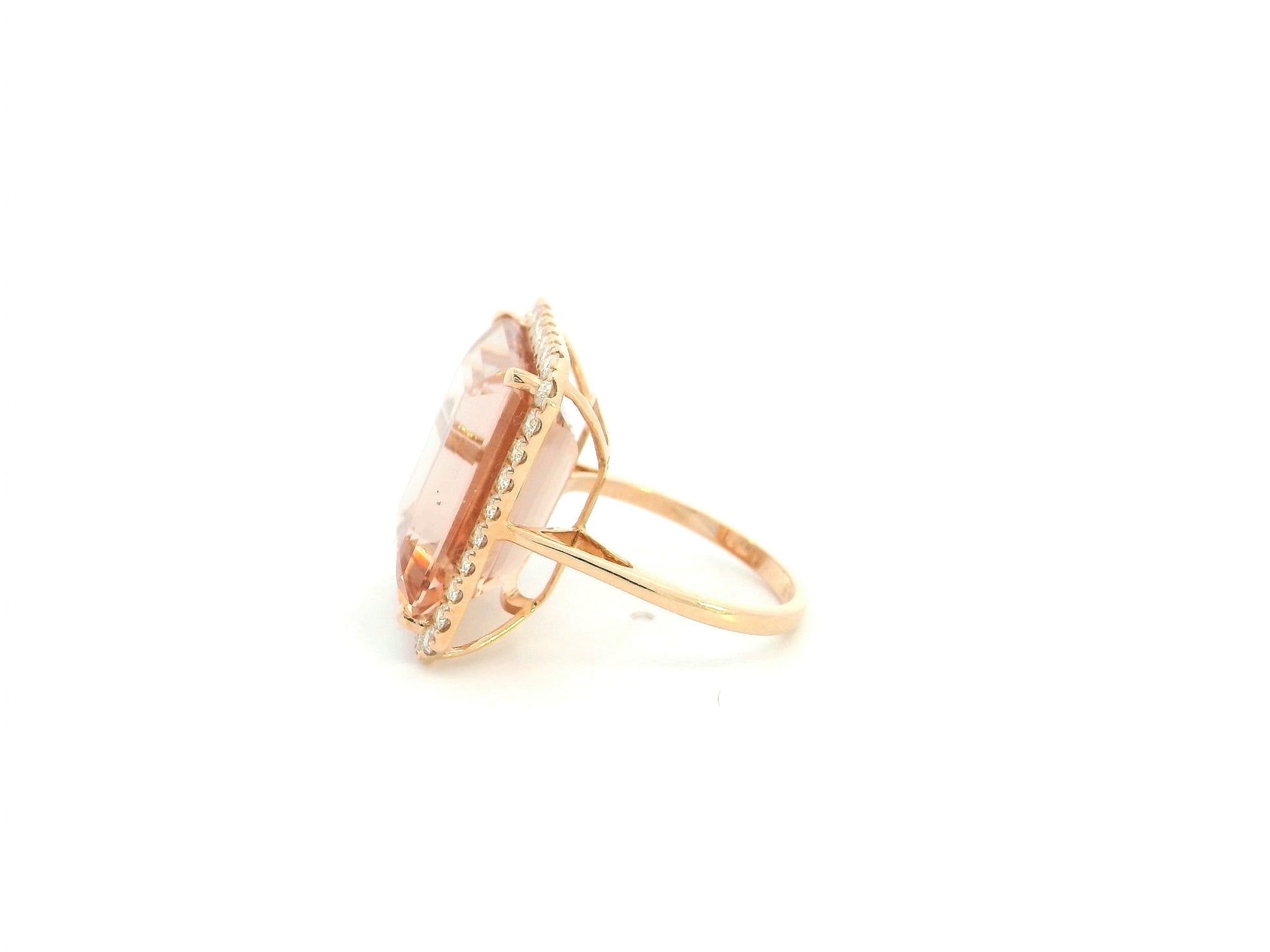 20.15 carat emerald cut Morganite and diamond halo ring in 18K rose gold by Emirates Diamonds