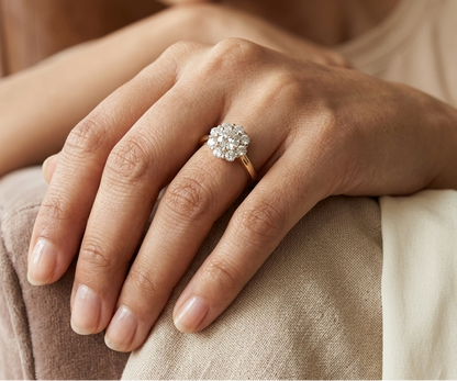 Natural diamond halo engagement ring in solid 18K yellow gold featuring a 0.70 carat IGI certified round brilliant centre diamond surrounded by 0.51 carat natural diamonds.