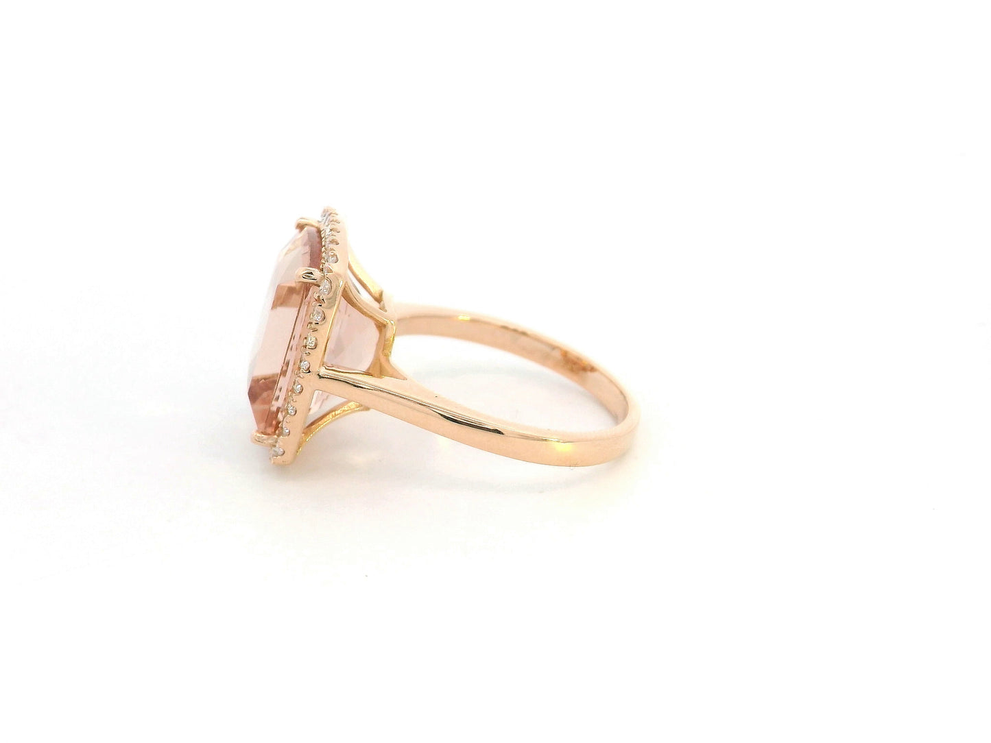 8.84 carat cushion morganite diamond halo ring in 18K rose gold by Emirates Diamonds Dubai