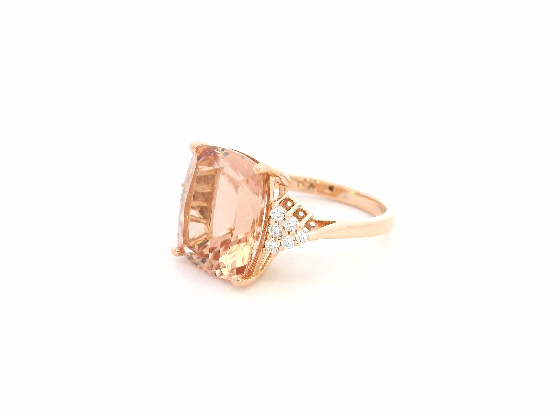 8.55 carat cushion morganite ring with diamond shoulder accents in 18K rose gold by Emirates Diamonds