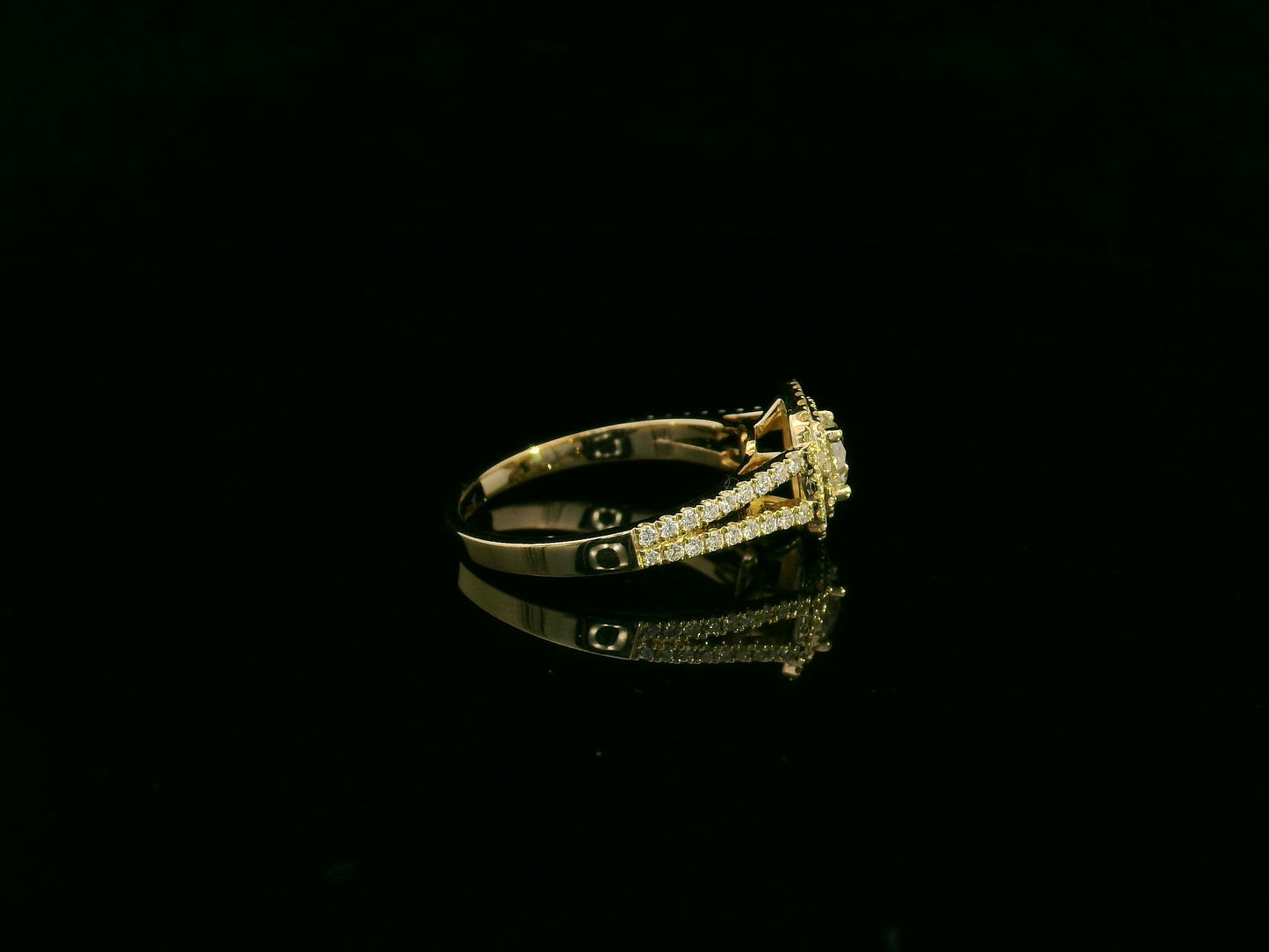 0.56 carat IGI certified diamond halo engagement ring in 18K yellow gold with split shank by Emirates Diamonds