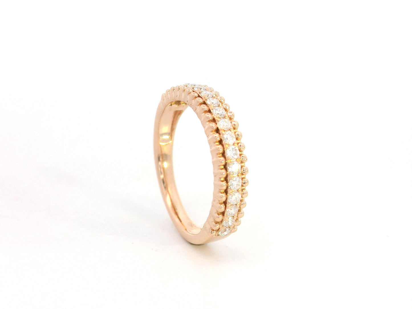 18K rose gold diamond eternity band ring with 0.35 carat round diamonds, minimal stacking wedding band by Emirates Diamonds.