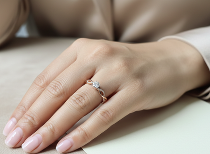 0.32 carat diamond solitaire twist engagement ring in 18K rose gold with pavé band by Emirates Diamonds