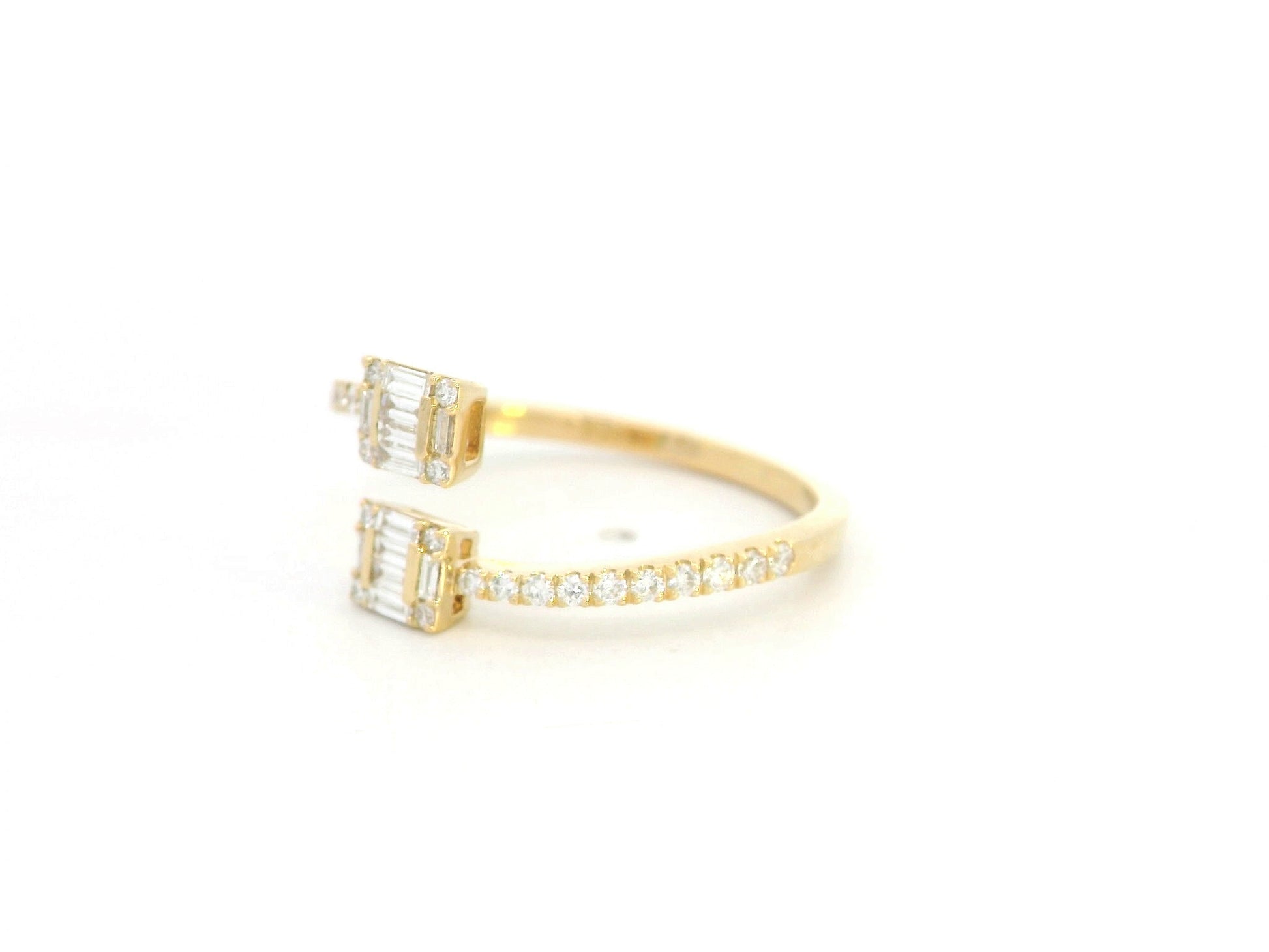 18K yellow gold open bypass ring with baguette and round diamond clusters, modern diamond ring by Emirates Diamonds