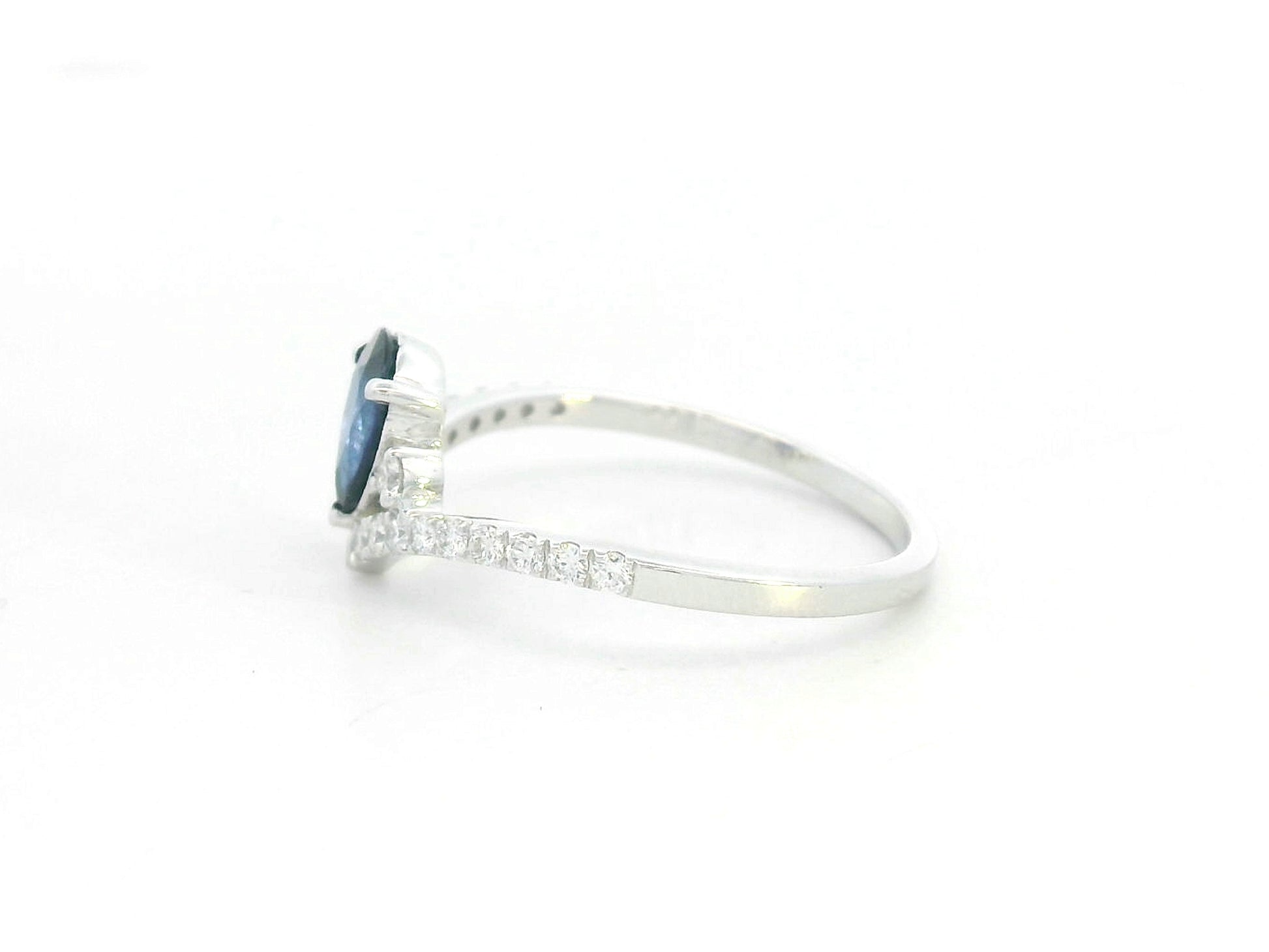 Pear blue sapphire diamond V shape ring in 18K white gold wishbone design Emirates Diamonds