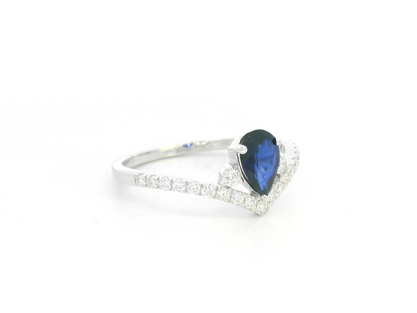 Pear blue sapphire diamond V shape ring in 18K white gold wishbone design Emirates Diamonds