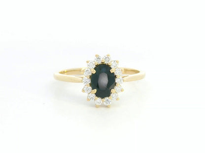 18K yellow gold oval sapphire ring with diamond halo, classic sapphire and diamond ring by Emirates Diamonds