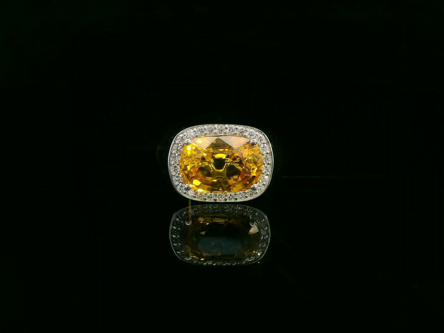 7.50 carat yellow sapphire men’s ring with diamond halo in 18K white gold by Emirates Diamonds Dubai