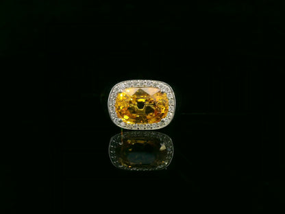 7.50 carat yellow sapphire men’s ring with diamond halo in 18K white gold by Emirates Diamonds Dubai