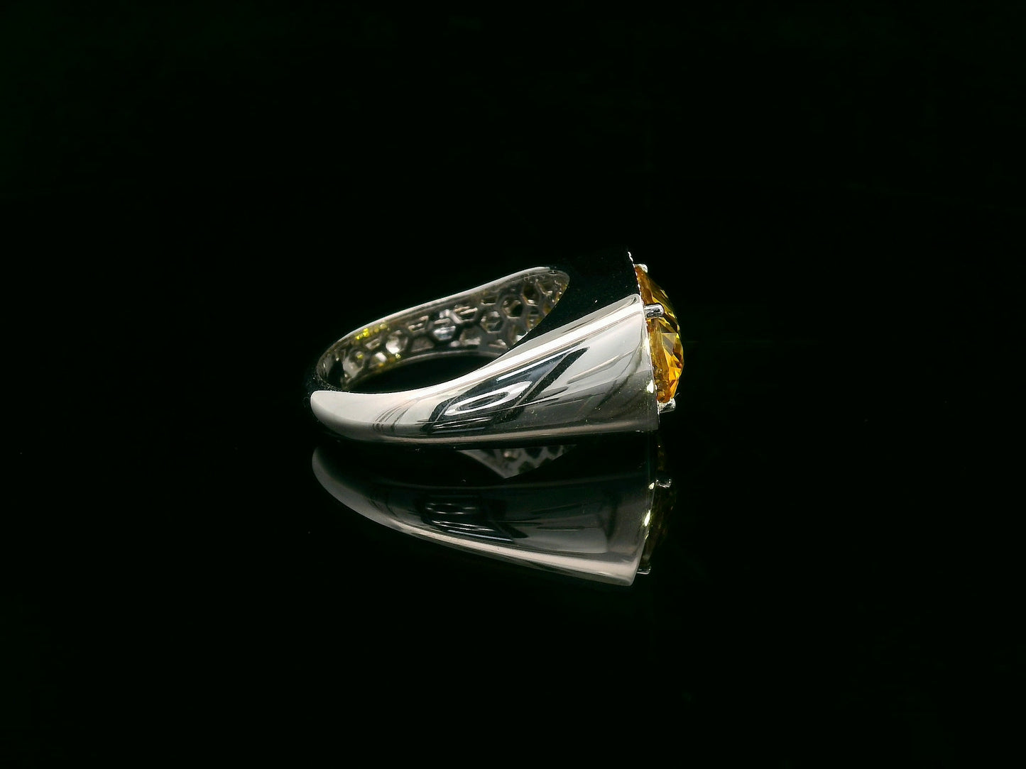 7.50 carat yellow sapphire men’s ring with diamond halo in 18K white gold by Emirates Diamonds Dubai