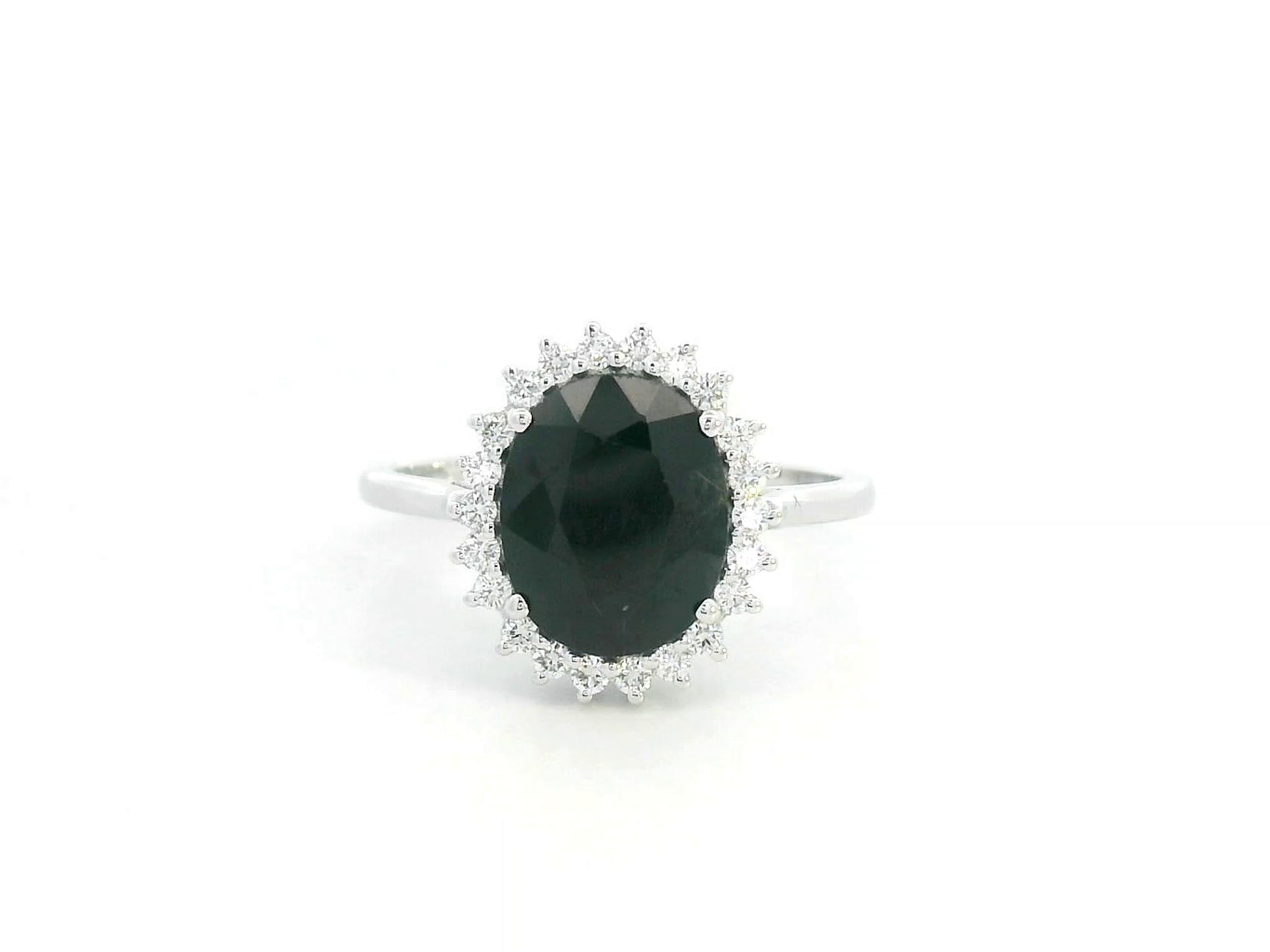 3.41 carat oval blue sapphire and diamond halo ring in 18K white gold by Emirates Diamonds