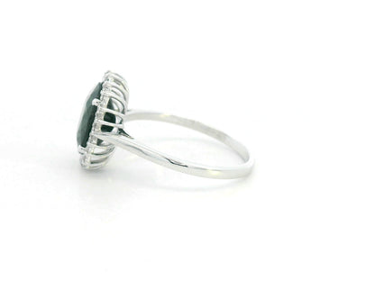 3.41 carat oval blue sapphire and diamond halo ring in 18K white gold by Emirates Diamonds