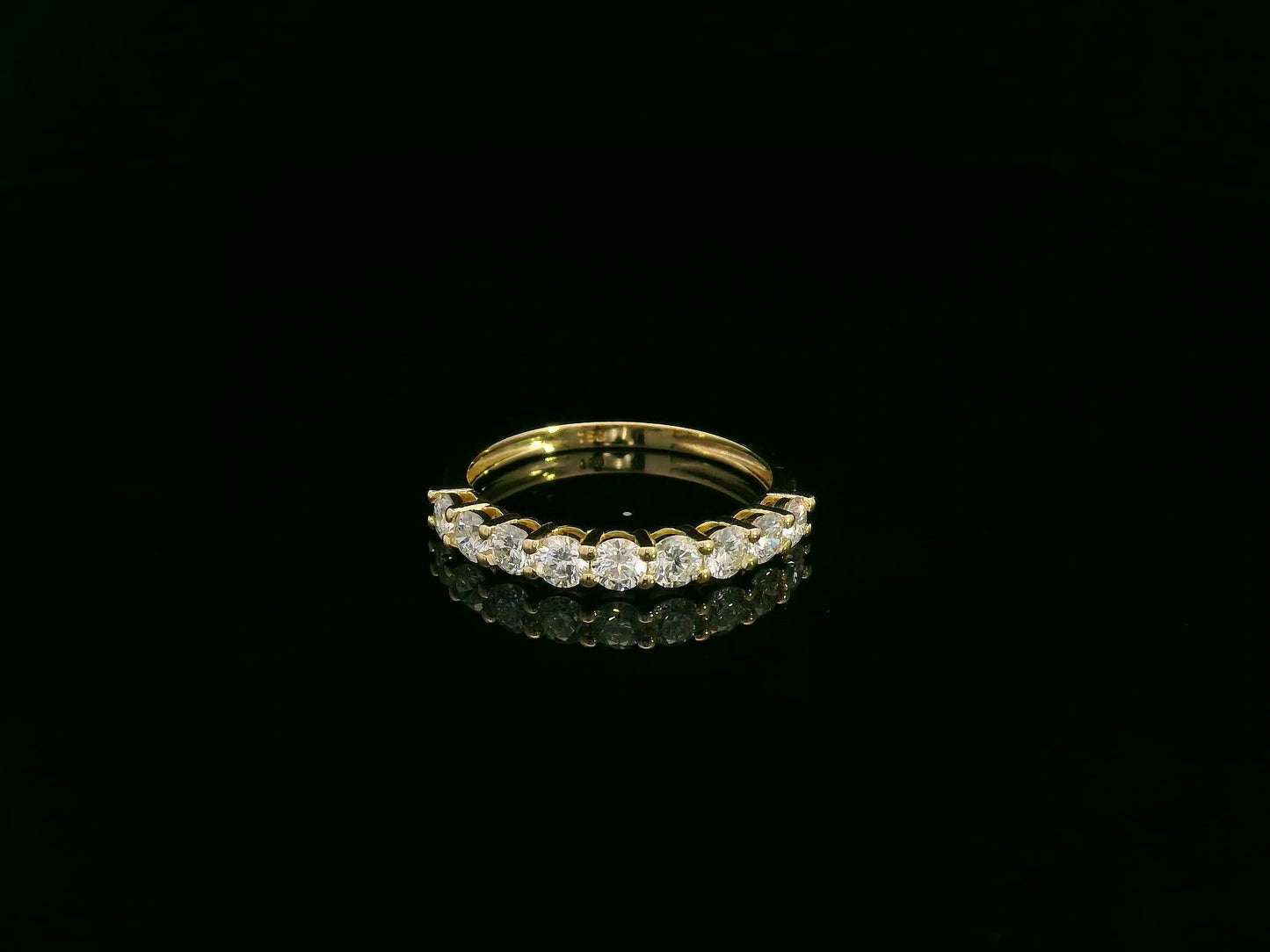 18K yellow gold diamond half eternity ring with round brilliant-cut diamonds by Emirates Diamonds
