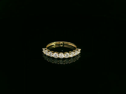 18K yellow gold diamond half eternity ring with round brilliant-cut diamonds by Emirates Diamonds