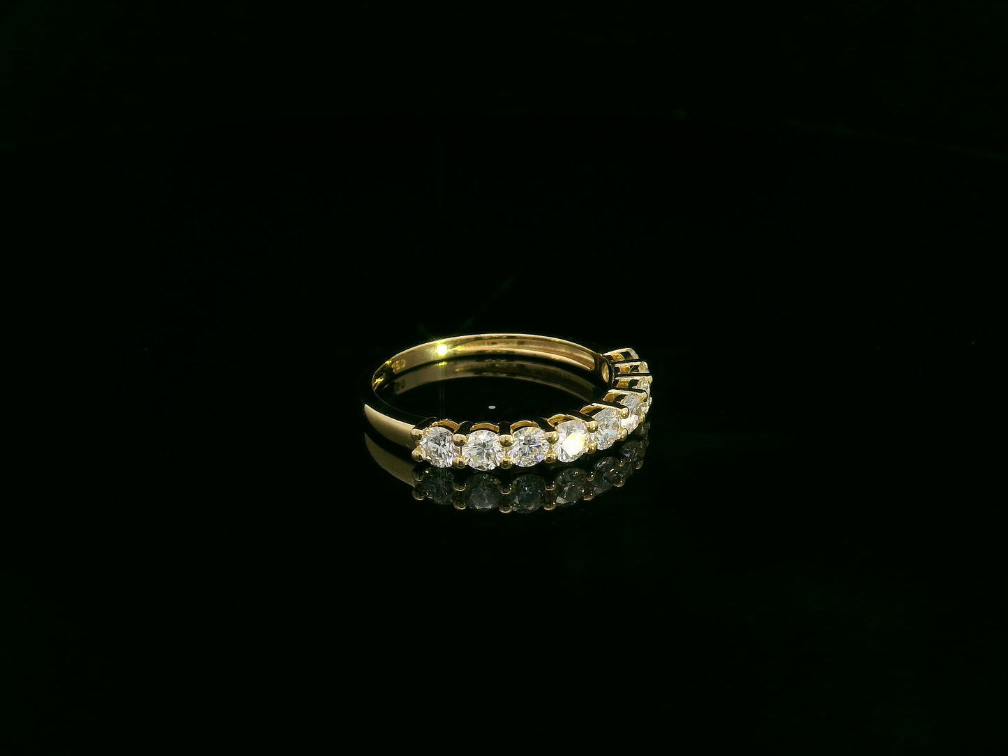 18K yellow gold diamond half eternity ring with round brilliant-cut diamonds by Emirates Diamonds