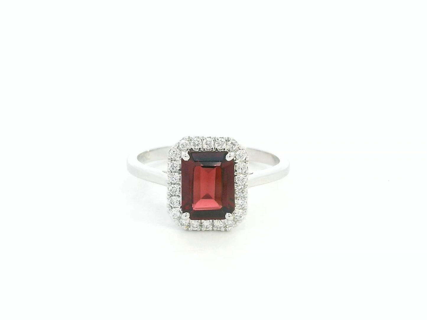 18K white gold emerald-cut garnet ring with diamond halo, elegant gemstone ring by Emirates Diamonds