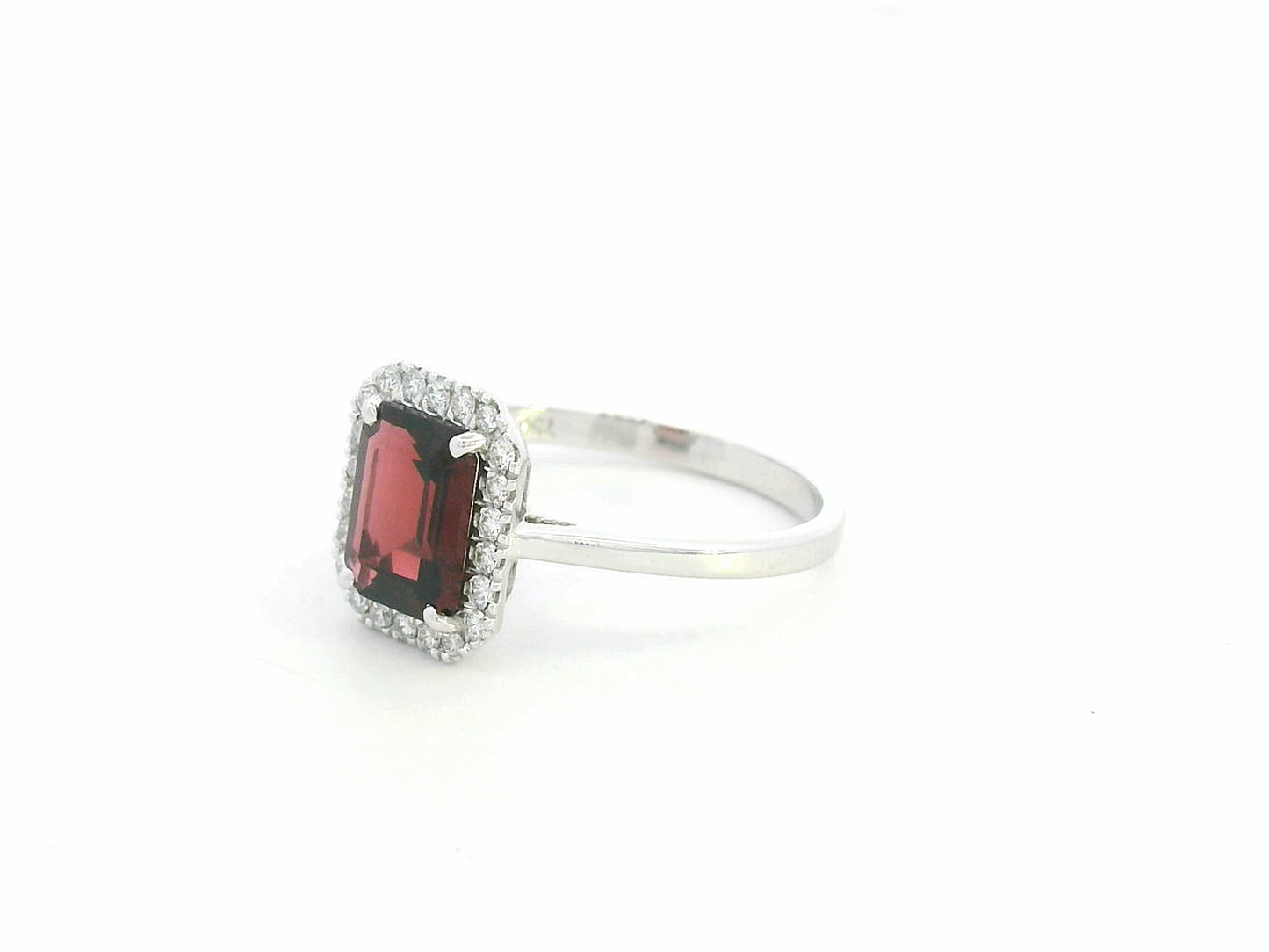 18K white gold emerald-cut garnet ring with diamond halo, elegant gemstone ring by Emirates Diamonds