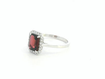 18K white gold emerald-cut garnet ring with diamond halo, elegant gemstone ring by Emirates Diamonds