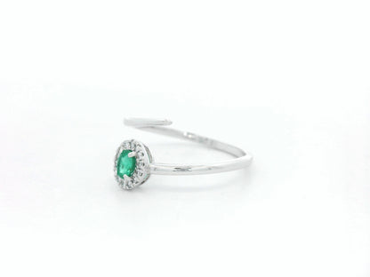 Emerald diamond halo wrap ring in 18K white gold with oval emerald and diamond halo