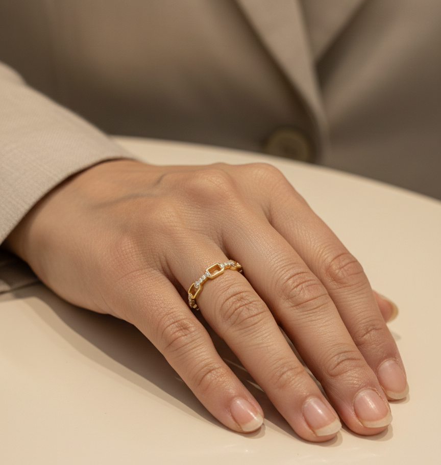 Diamond link band ring in 18K yellow gold with pavé diamond accents by Emirates Diamonds