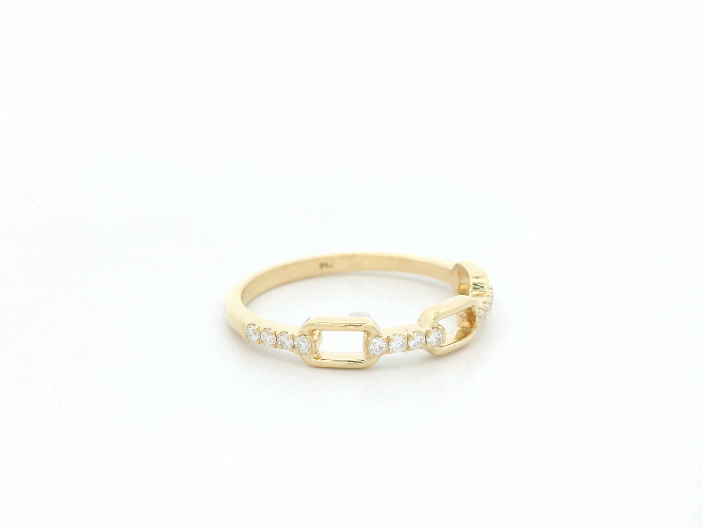 Diamond link band ring in 18K yellow gold with pavé diamond accents by Emirates Diamonds